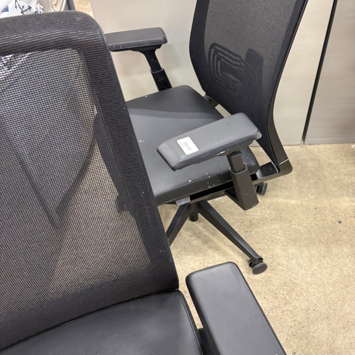 Mesh Back Office Task Chair - rear three-quarter view showing the mesh back and adjustable arm