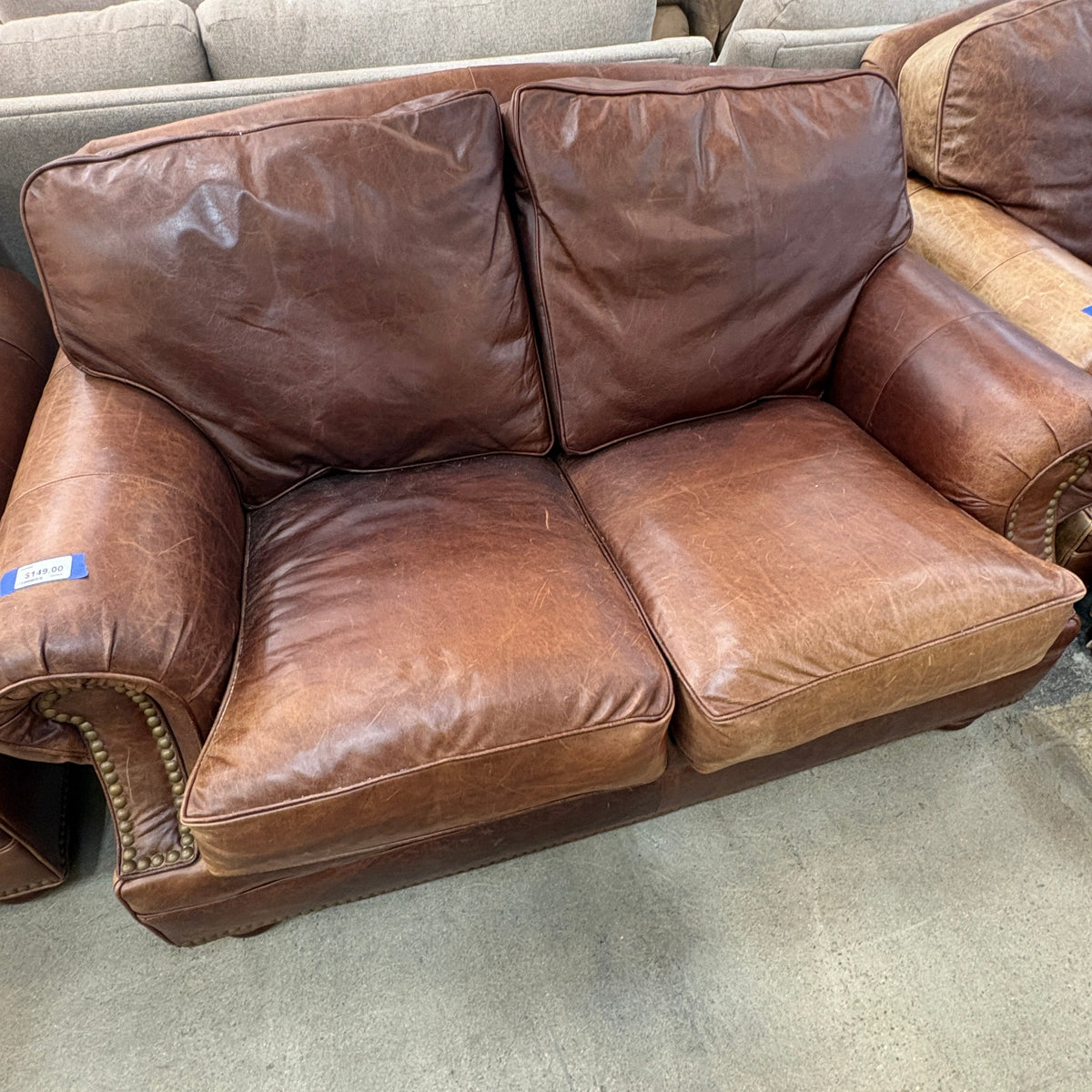 Brown Leather Loveseat