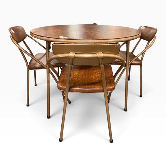 Round Dinette Table with Four Tubular Metal Chairs at the Urbandale Habitat ReStore