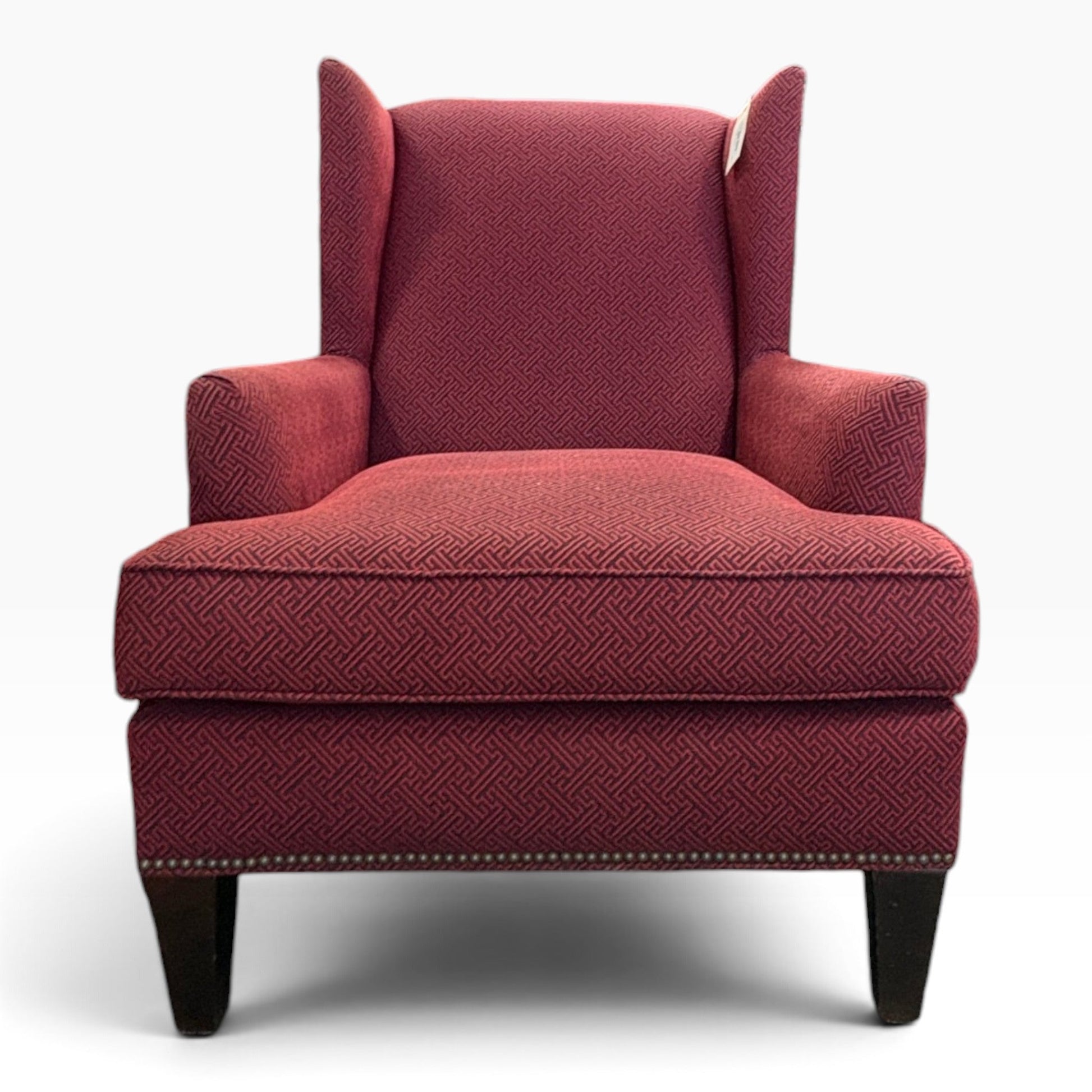 Burgundy Greek-Key Wingback Chair with Nailhead Trim at the Urbandale Habitat ReStore