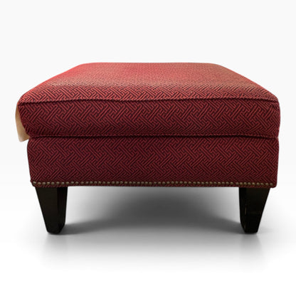 Burgundy Greek-Key Ottoman with Nailhead Trim at the Urbandale Habitat ReStore