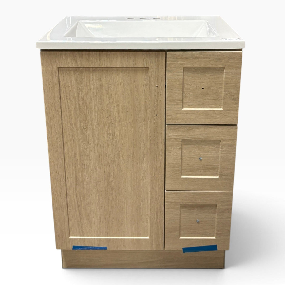 24 in Light Oak Shaker Vanity with Ceramic Sink Top at the Urbandale Habitat ReStore