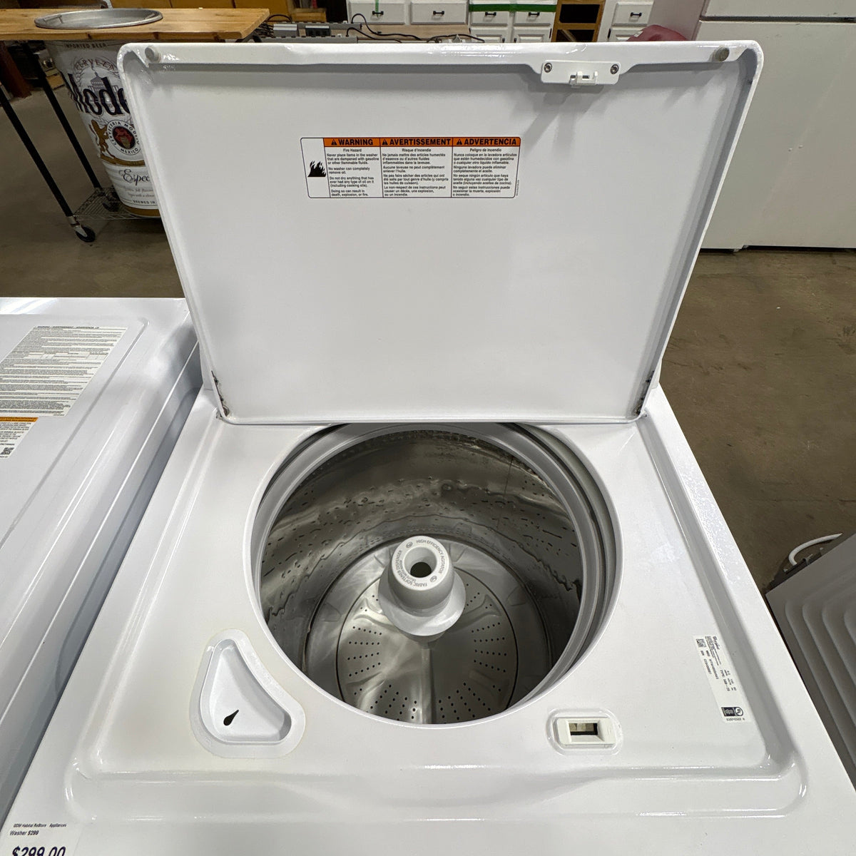 Whirlpool Deep Water Washer - lid open showing the stainless tub and impeller post
