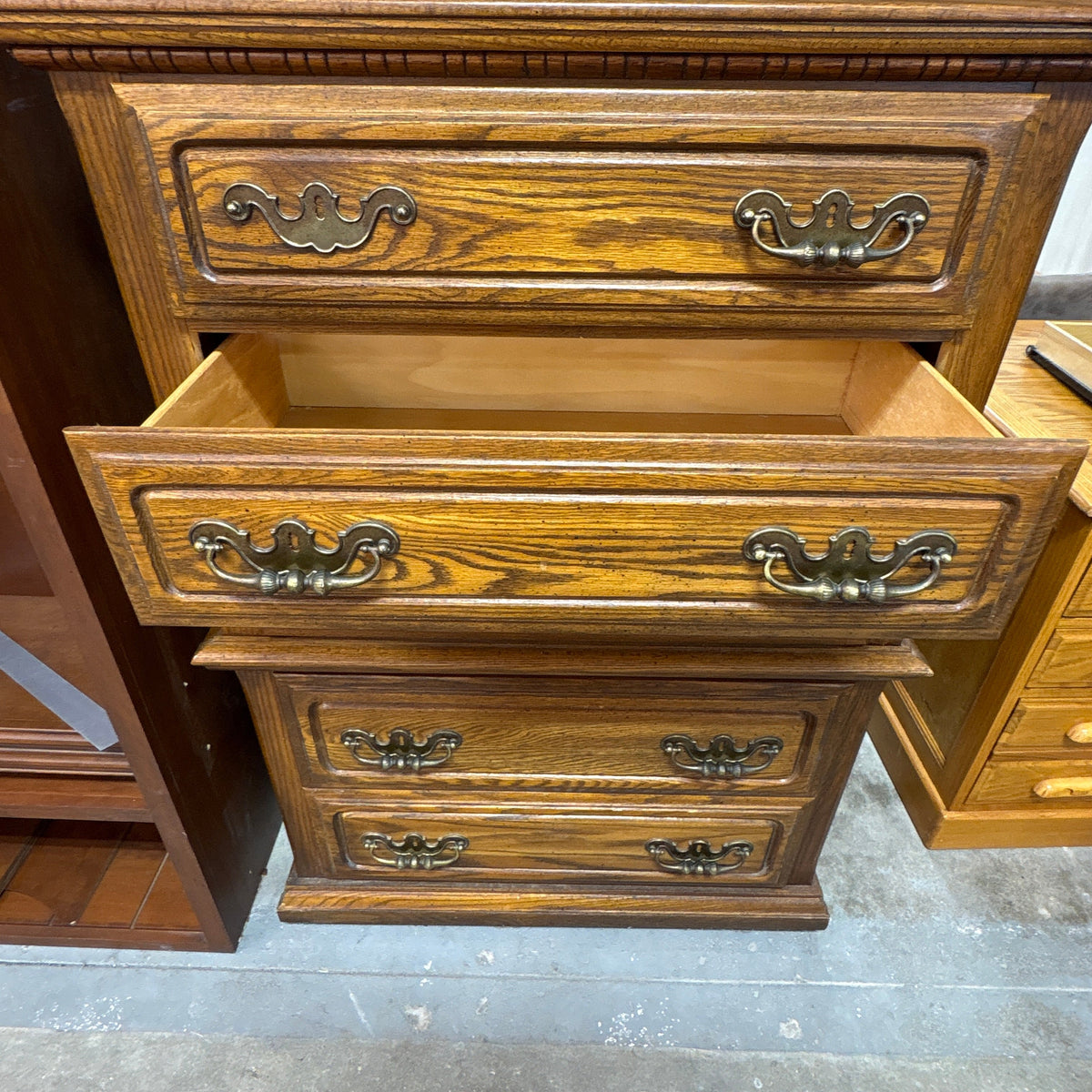 Lea Oak 5 Drawer Tall Chest - two drawers open, brass batwing pulls in view