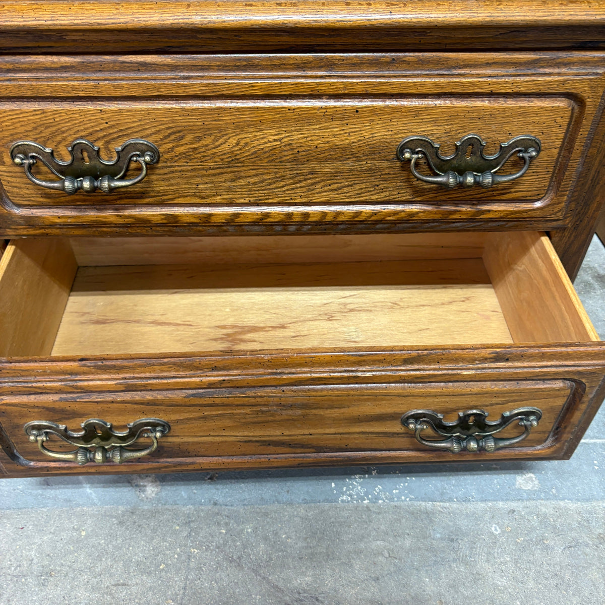 Lea Oak 5 Drawer Tall Chest - lower drawer open showing the oak interior