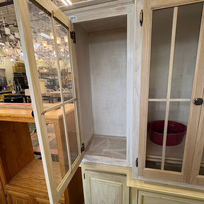 Oak Lighted China Hutch - upper glass doors open showing the lit interior shelving