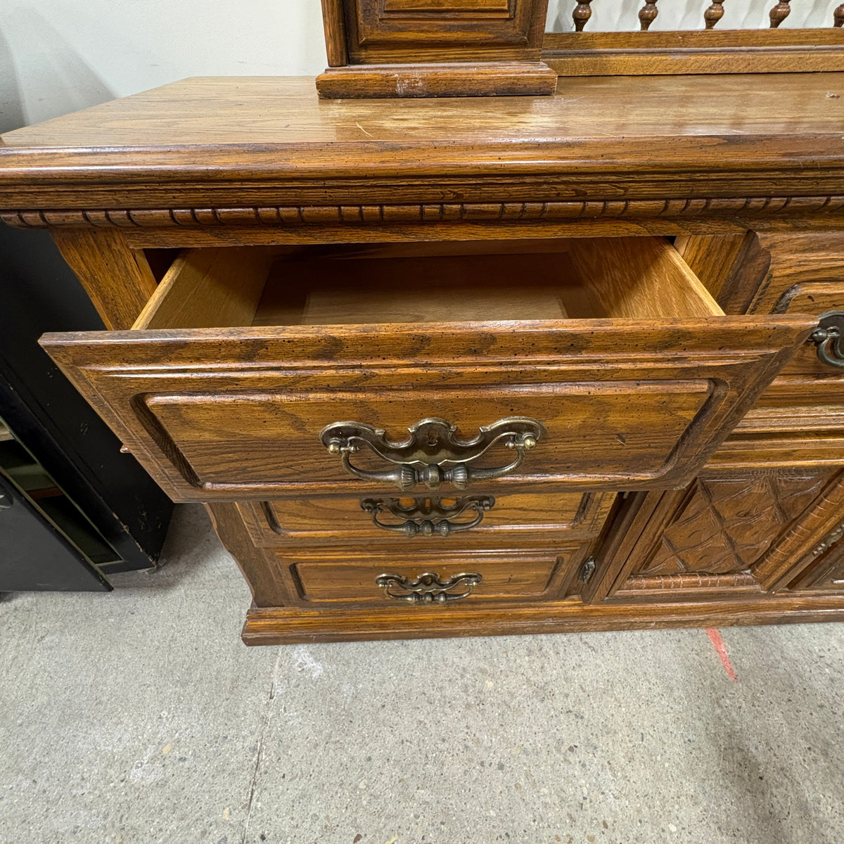 Oak Triple Dresser with Mirror - top surface showing the water marks and scratches