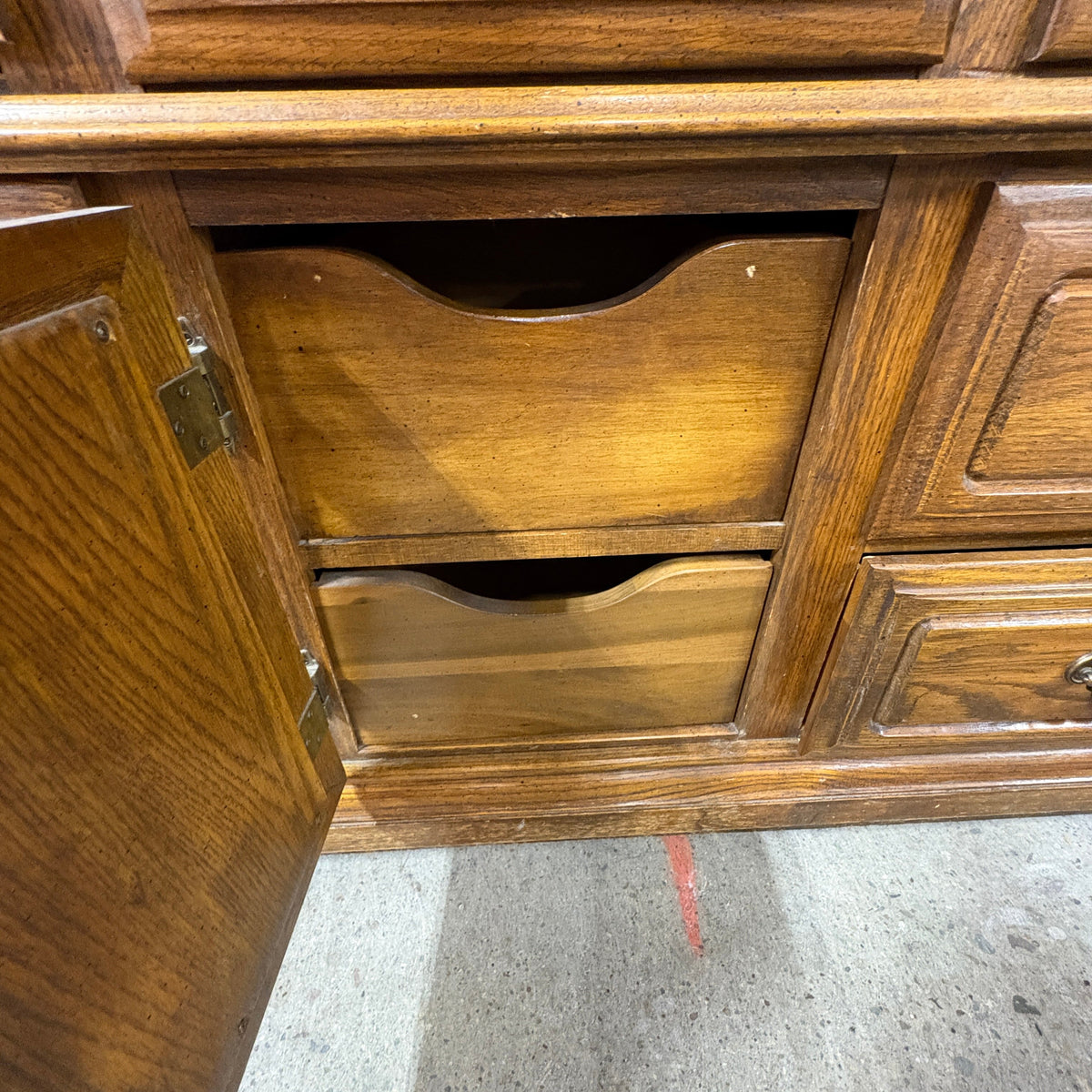 Oak Triple Dresser with Mirror - center cabinet door open showing the two scoop-front drawers