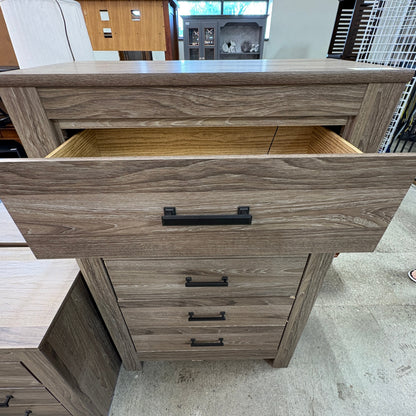 Ashley 5 Drawer Chest - top drawer pulled open showing the light wood interior