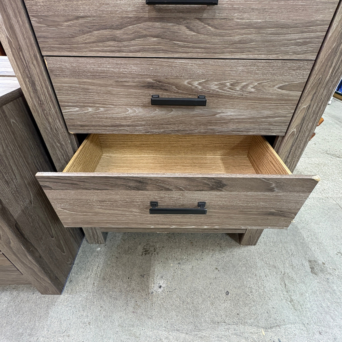 Ashley 5 Drawer Chest - middle drawer open showing the smooth light wood box