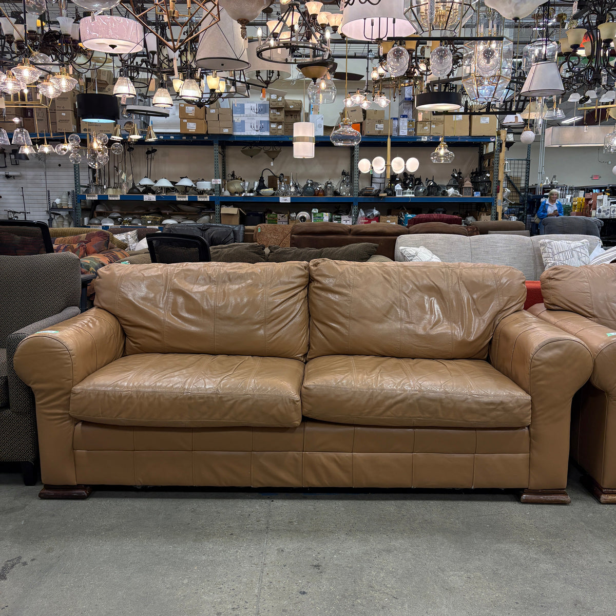 Tan Leather Sofa - full front view of the sofa on the sales floor