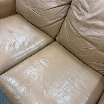 Tan Leather Loveseat - close-up of the leather seat and back cushions