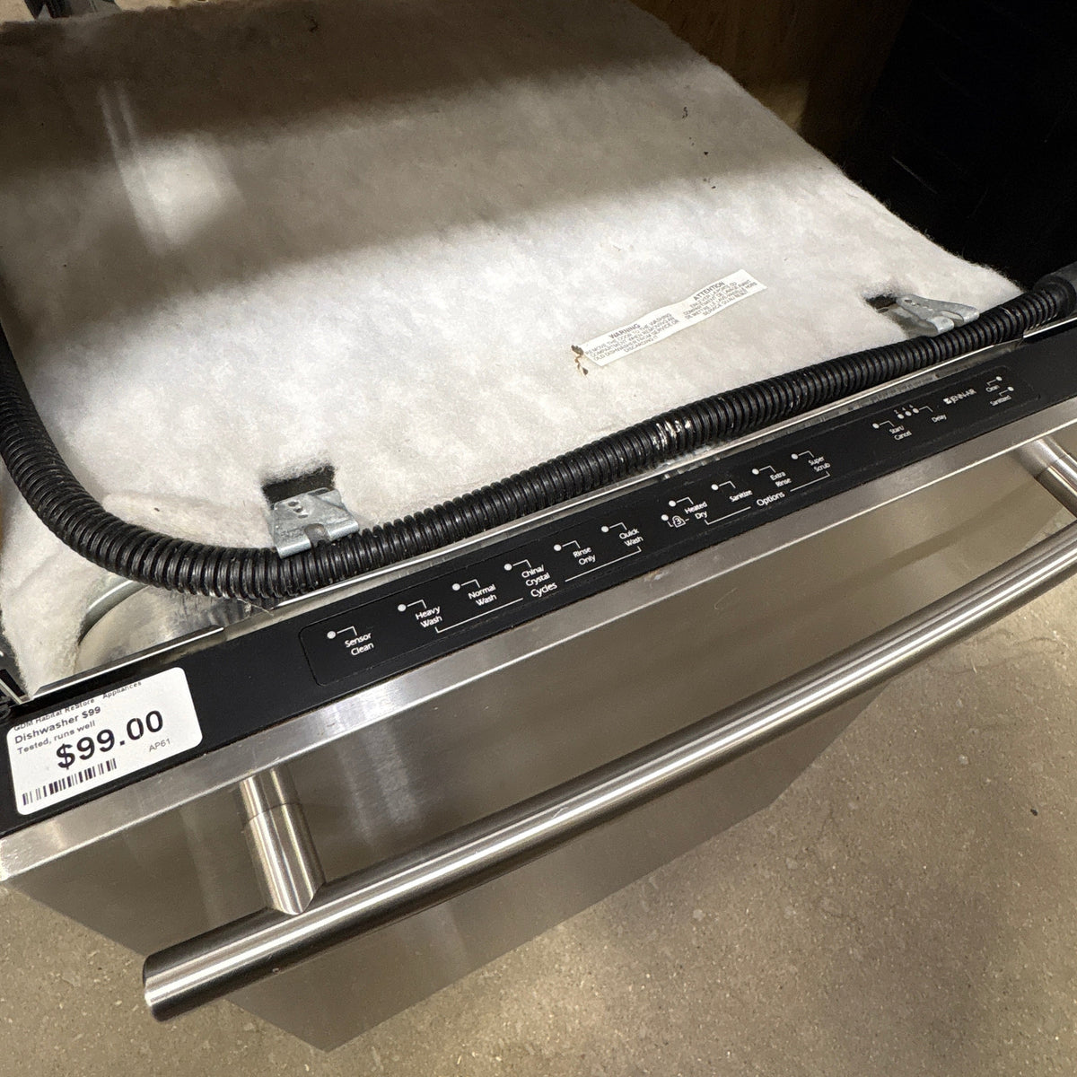 Jenn Air Built In Dishwasher - close-up of the top-edge control panel and the stainless handle