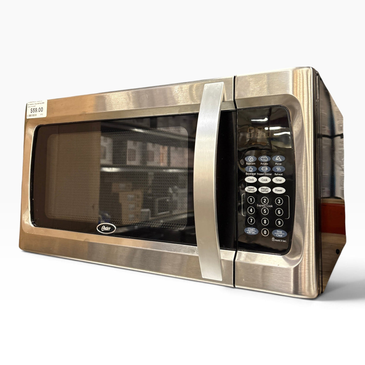 GDM Habitat for Humanity ReStore Oster Countertop Microwave