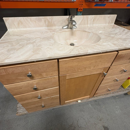 49 in Maple Vanity Set - looking down on the cultured marble top, moulded sink and faucet