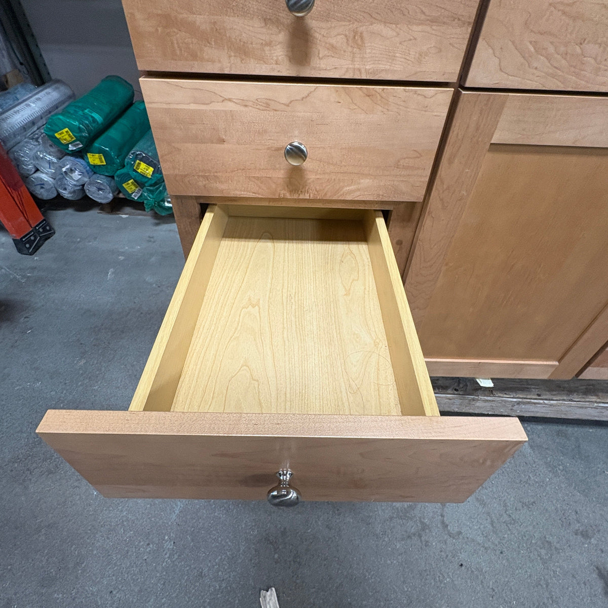 49 in Maple Vanity Set - left bank drawer open with the ball-bearing slide visible