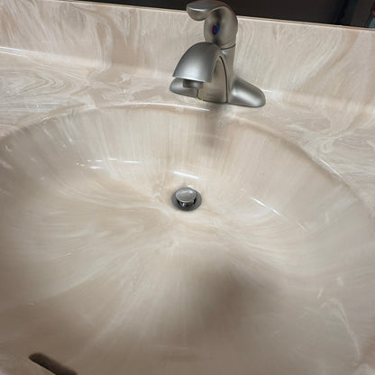 49 in Maple Vanity Set - close-up of the moulded sink bowl and the brushed-nickel faucet