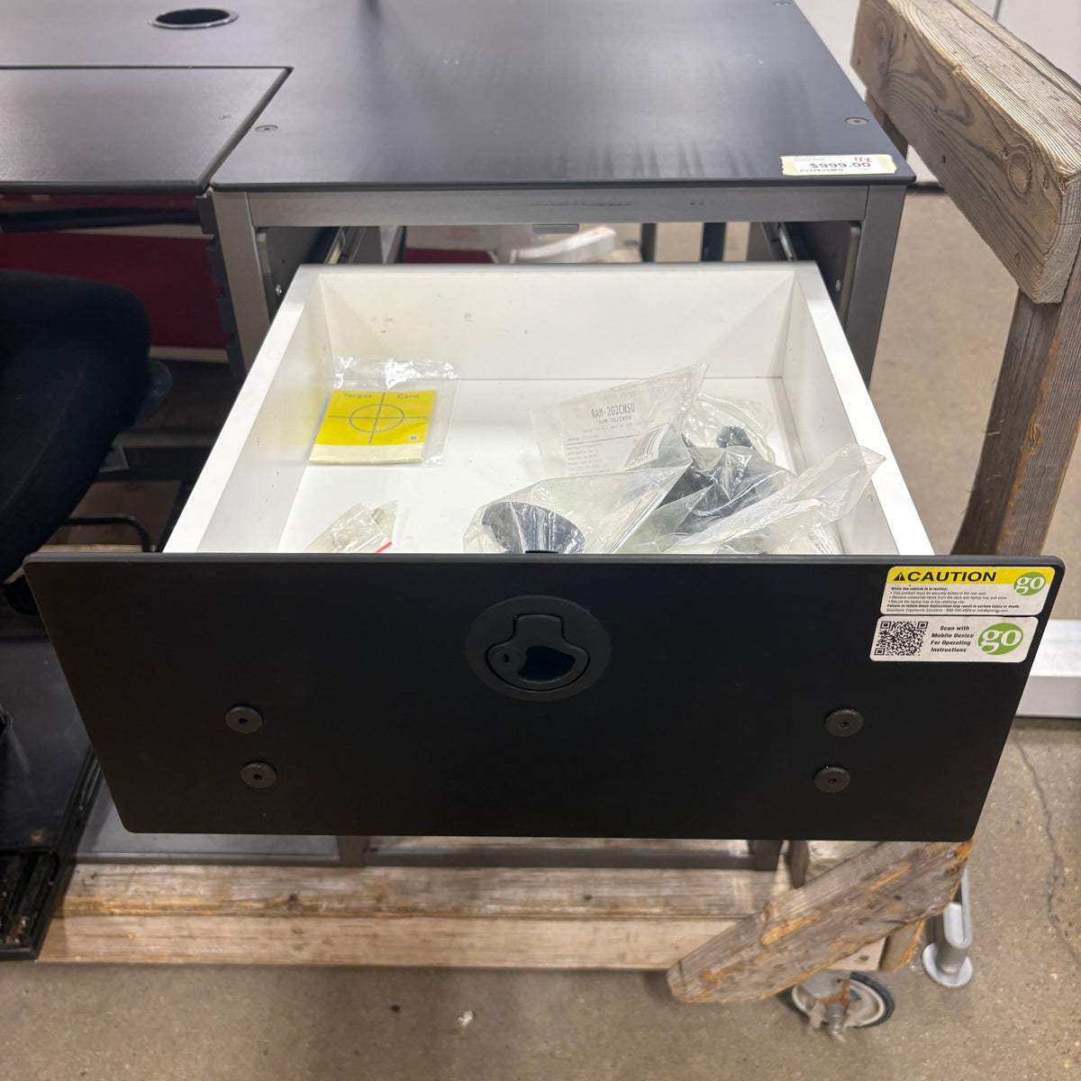 Mobile Desk and Chair Set - drawer open with the bagged mounting hardware inside