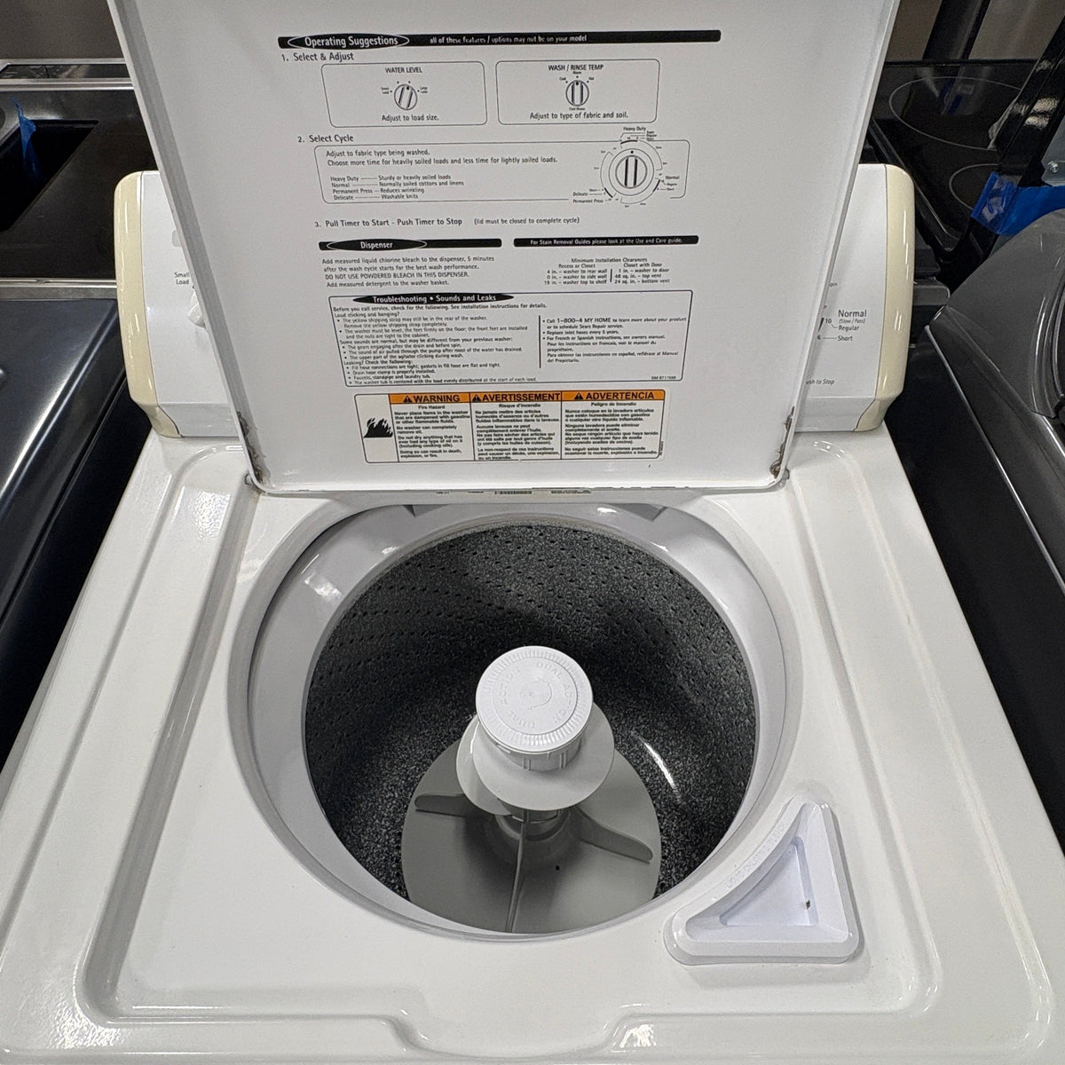 Kenmore Super Capacity Washer - lid open showing the centre-post agitator and the tub