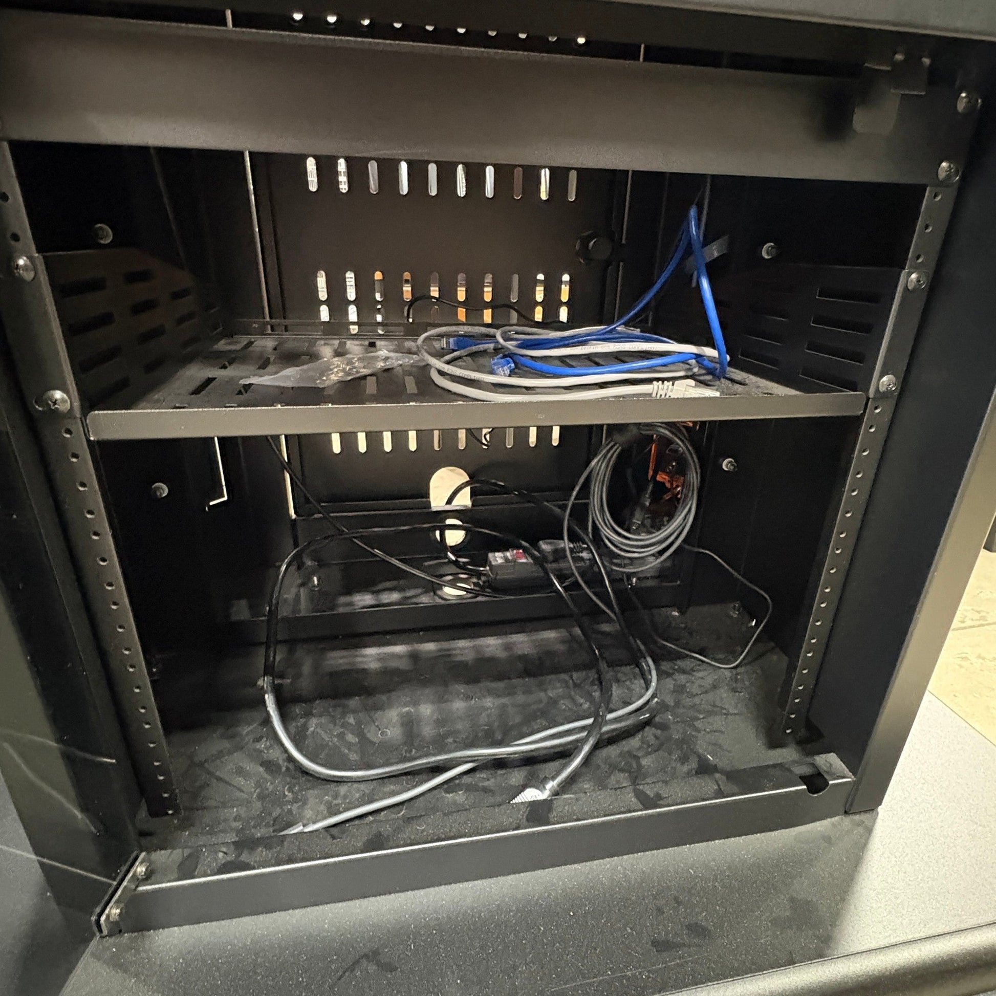 Interior of GDM Habitat for Humanity ReStore Avteq RPS-800S workstation cabinet with shelving and cable management