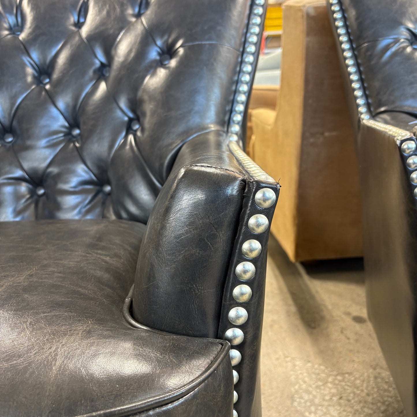 Black Tufted Leather Armchair