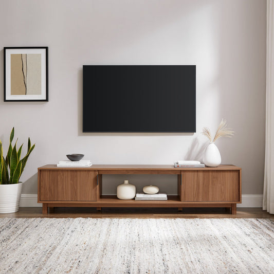 Arundo 70 inch Mocha TV stand, front view in a living room
