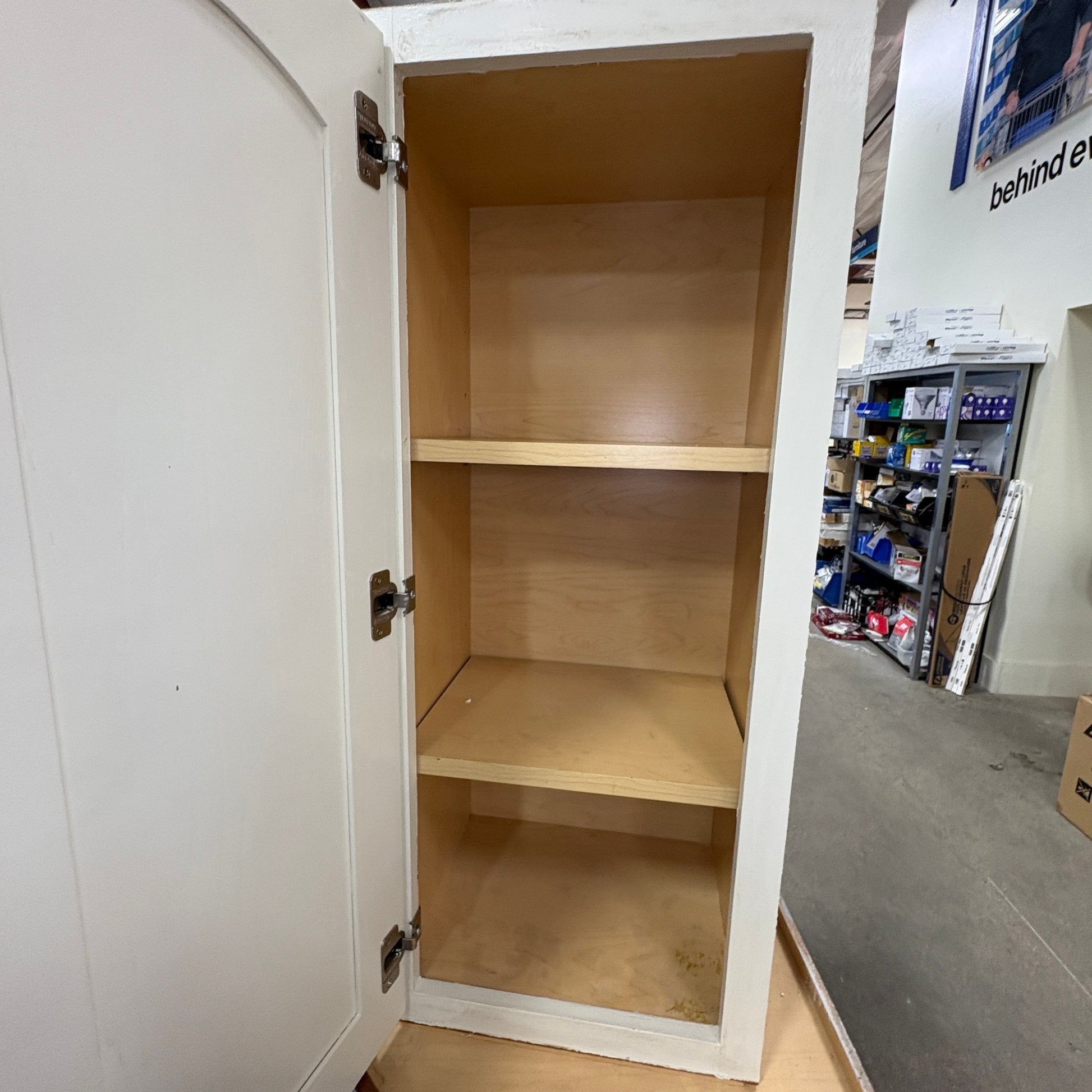 GDM Habitat for Humanity ReStore antique white cabinet with open door and two interior wooden shelves