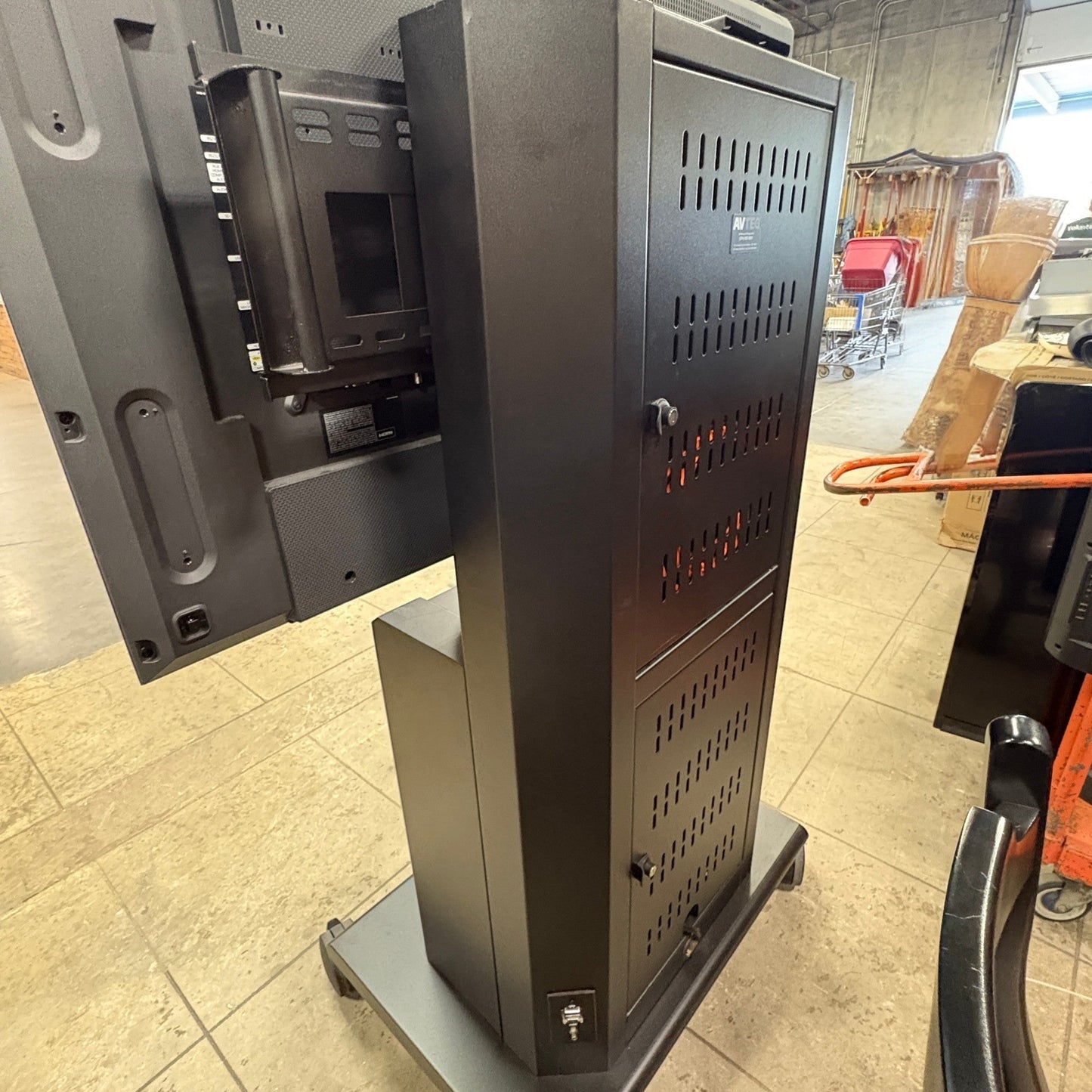 GDM Habitat for Humanity ReStore Avteq RPS-800S black steel mobile AV workstation cart with locking storage cabinet.