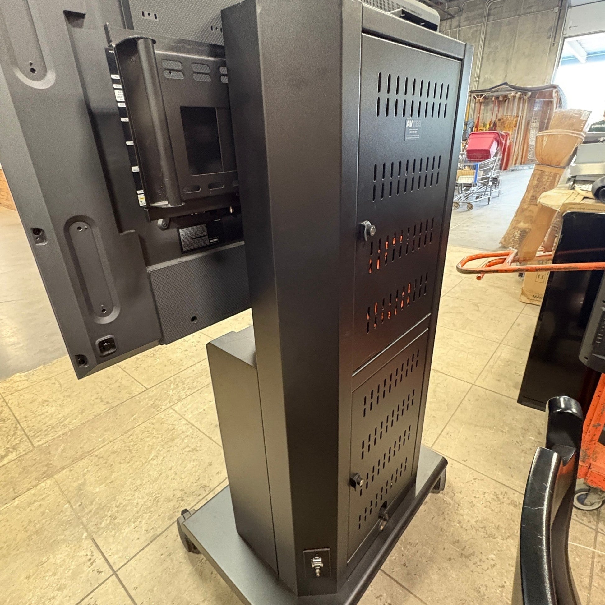 GDM Habitat for Humanity ReStore Avteq RPS-800S black steel mobile AV workstation cart with locking storage cabinet.