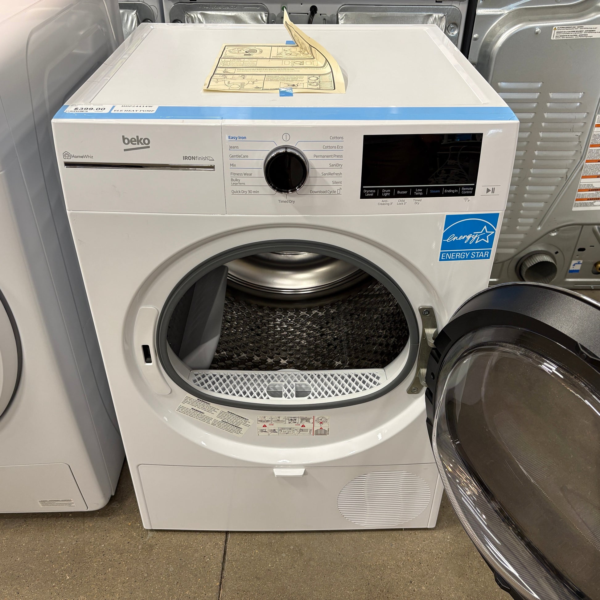 GDM Habitat for Humanity ReStore Beko white front-load heat pump dryer with Energy Star rating and open door