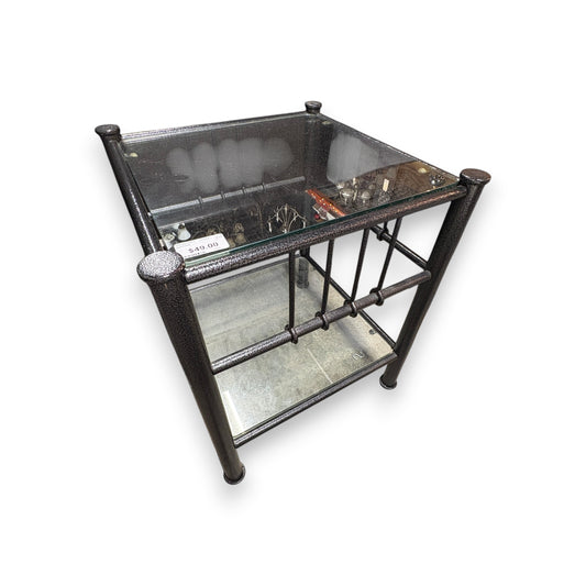 GDM Habitat for Humanity ReStore black metal end table with a glass top and lower shelf in a modern style