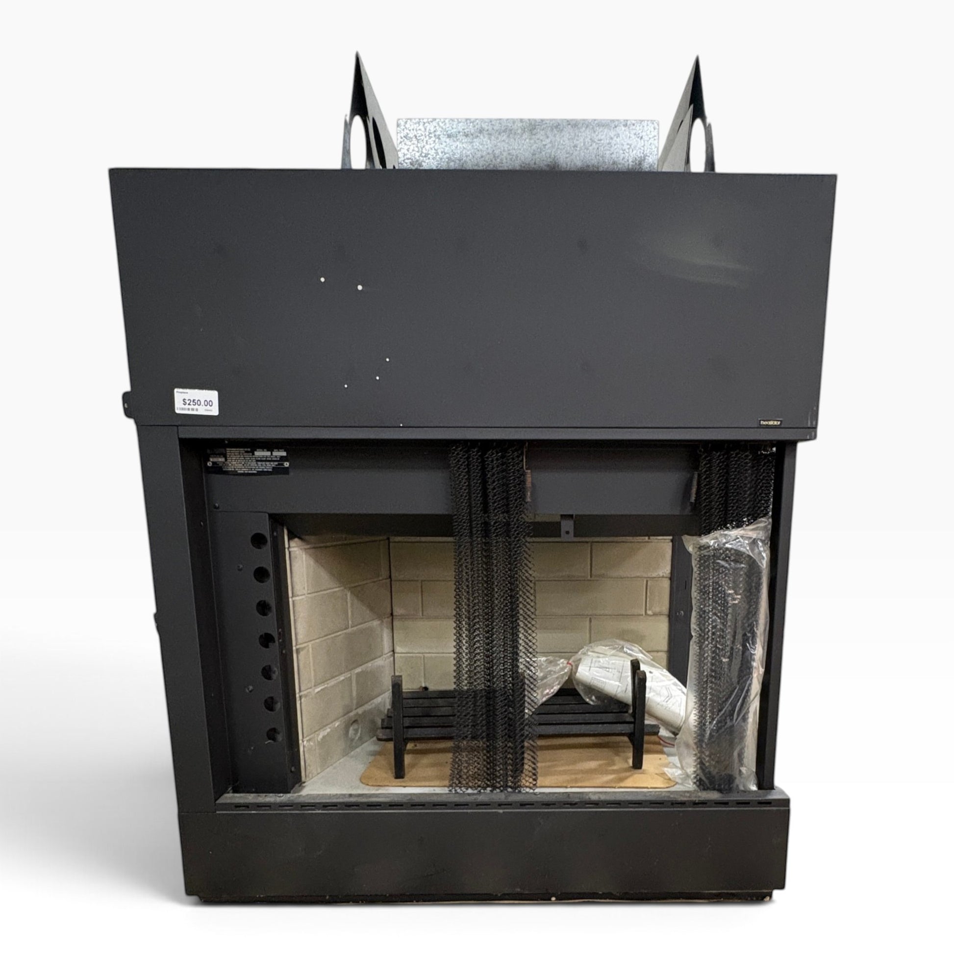 GDM Habitat for Humanity ReStore black metal fireplace insert with brick interior and protective mesh screen