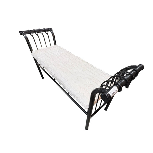 GDM Habitat for Humanity ReStore black metal scroll bench with a textured white cushioned seat