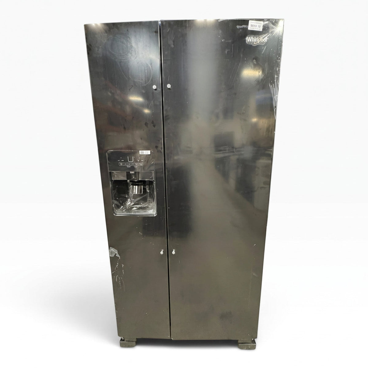 GDM Habitat for Humanity ReStore black Whirlpool side-by-side refrigerator with exterior ice and water dispenser