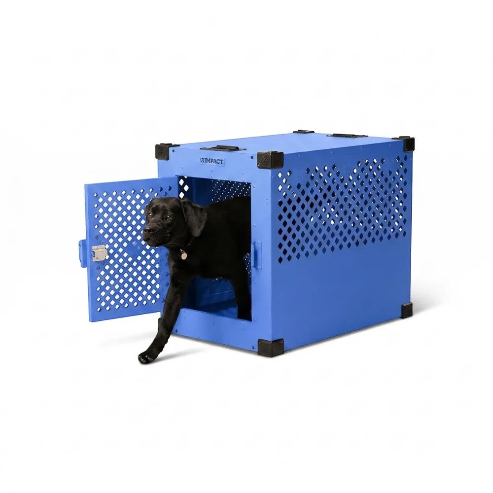 GDM Habitat for Humanity ReStore blue Impact Dog Crate with a black Labrador retriever stepping out of the open door