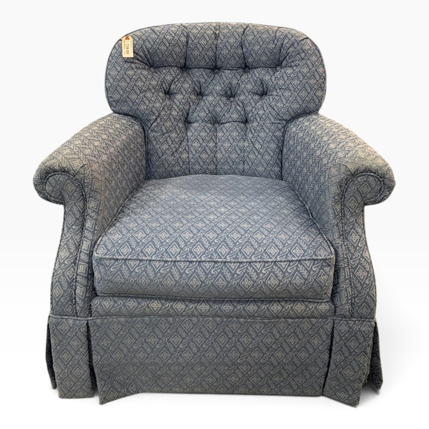 GDM Habitat for Humanity ReStore blue patterned armchair with tufted back and rolled arms