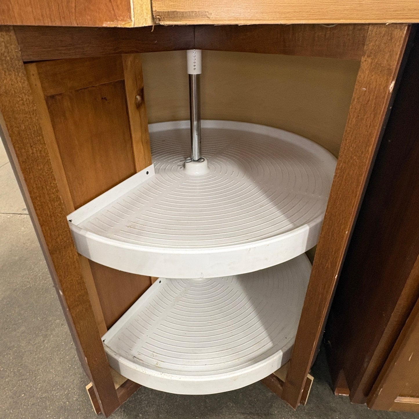 GDM Habitat for Humanity ReStore brown wooden corner kitchen cabinet with white rotating lazy susan shelves