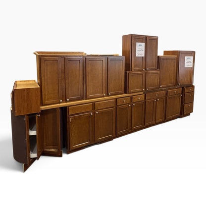 GDM Habitat for Humanity ReStore 13-piece brown wooden kitchen cabinet set with shaker-style doors and silver knobs