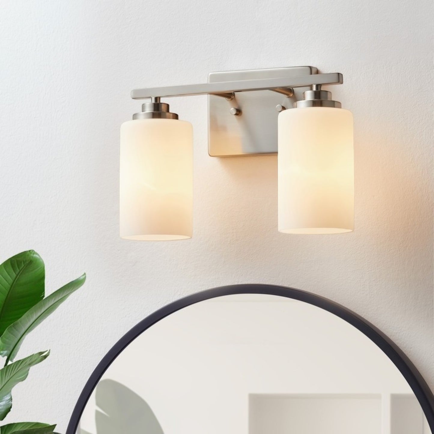 GDM Habitat for Humanity ReStore 2-light vanity fixture with brushed nickel finish and cylindrical frosted glass shades