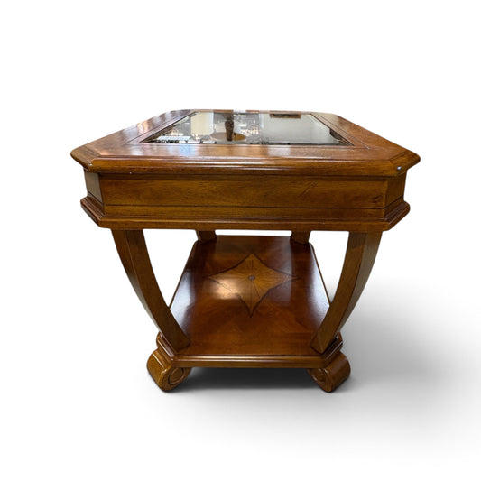 GDM Habitat for Humanity ReStore cherry wood end table with smoked glass top, lower shelf, and splayed legs.