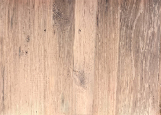 Cloud Grey Oak laminate flooring planks from GDM Habitat for Humanity ReStore with natural wood grain texture