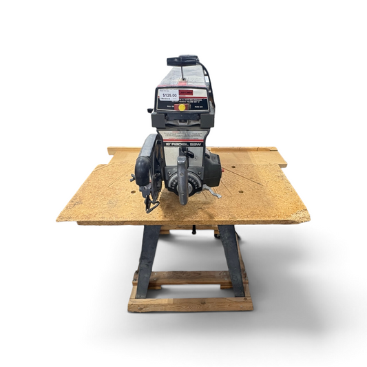 GDM Habitat for Humanity ReStore Craftsman 10-inch radial arm saw with a wooden work table and metal base.