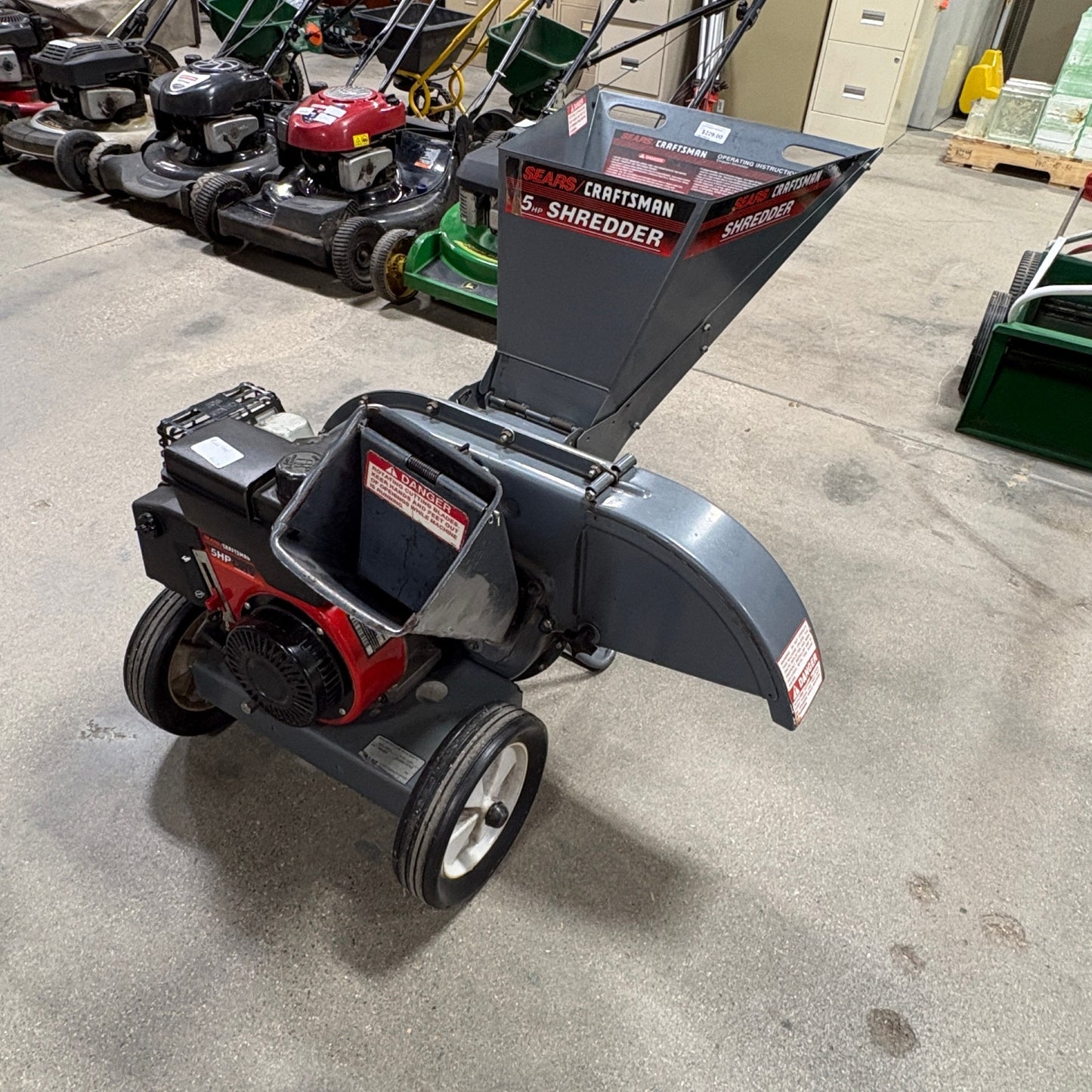 GDM Habitat for Humanity ReStore Craftsman 5HP gas-powered wood chipper shredder with dual-feed hopper and steel frame.