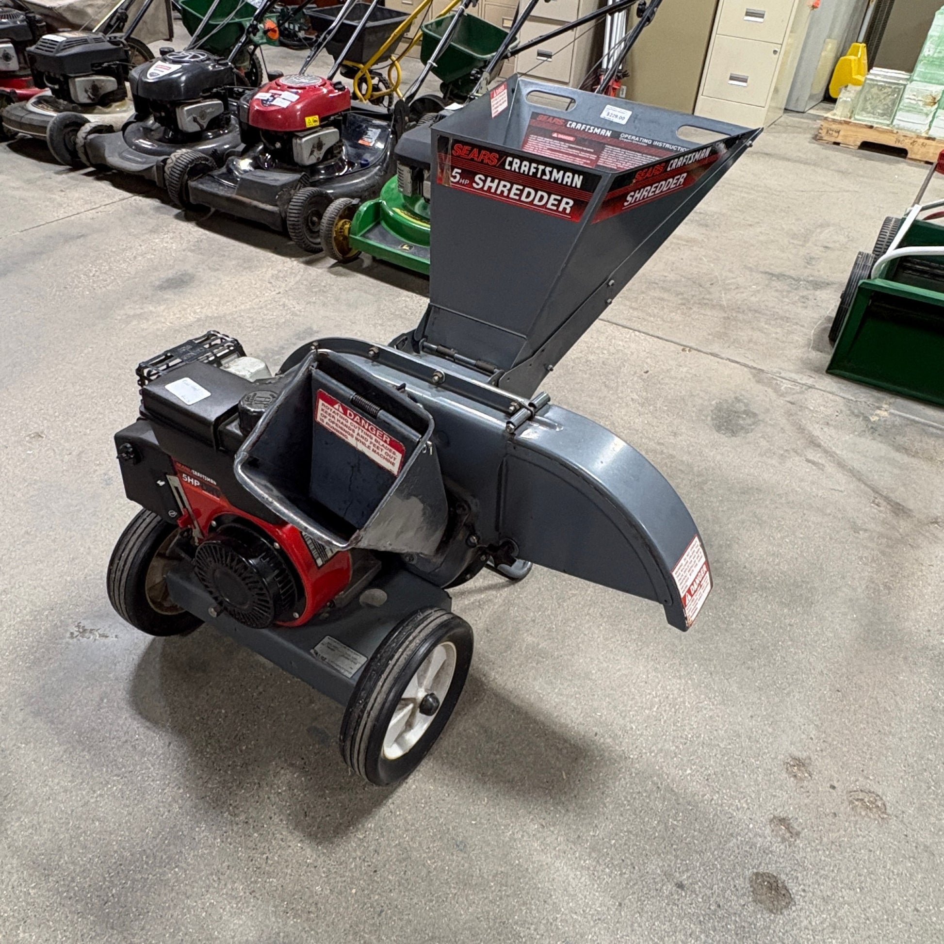 GDM Habitat for Humanity ReStore Craftsman 5HP gas-powered wood chipper shredder with dual-feed hopper and steel frame.