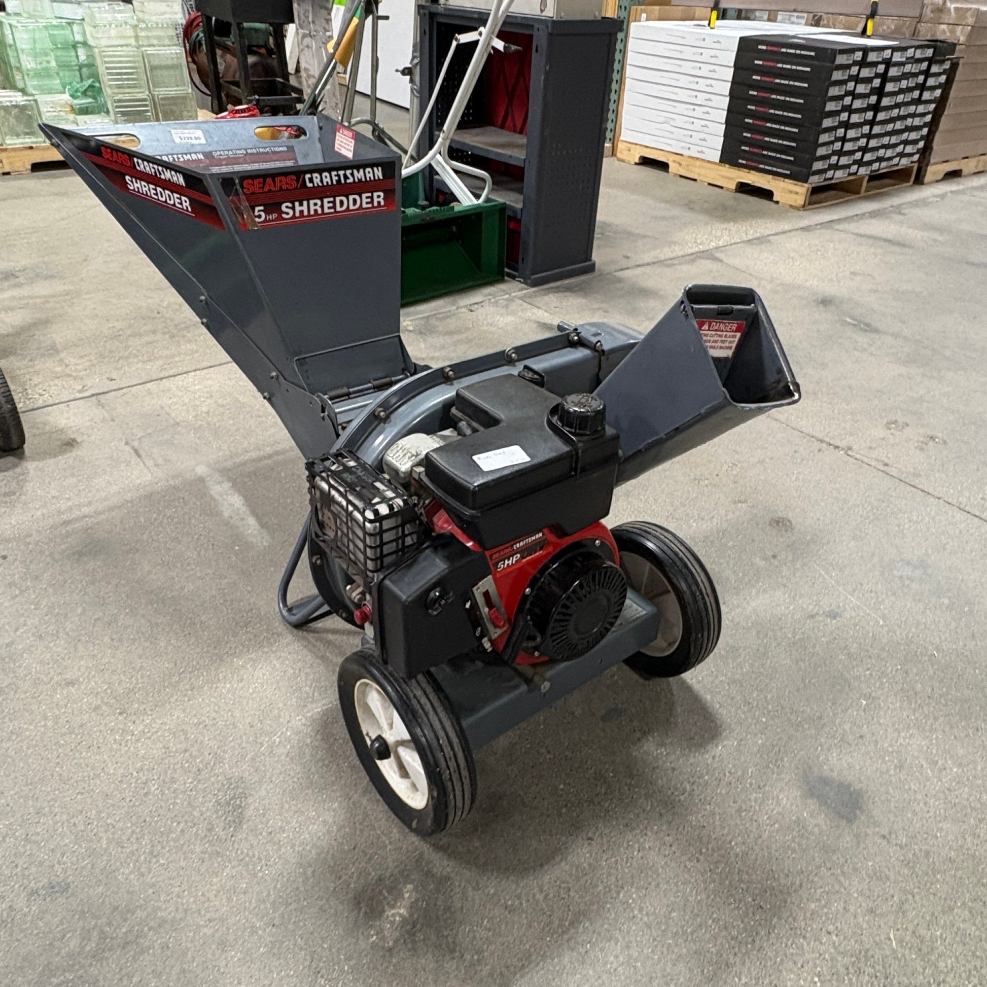 GDM Habitat for Humanity ReStore Craftsman 5HP gas-powered wood chipper shredder with dual-feed hopper and side chute.
