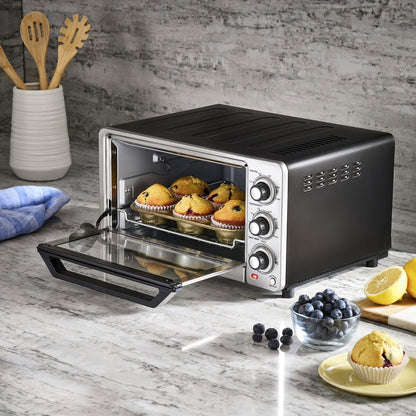 GDM Habitat for Humanity ReStore Cuisinart toaster oven broiler with muffins baking on a marble kitchen countertop
