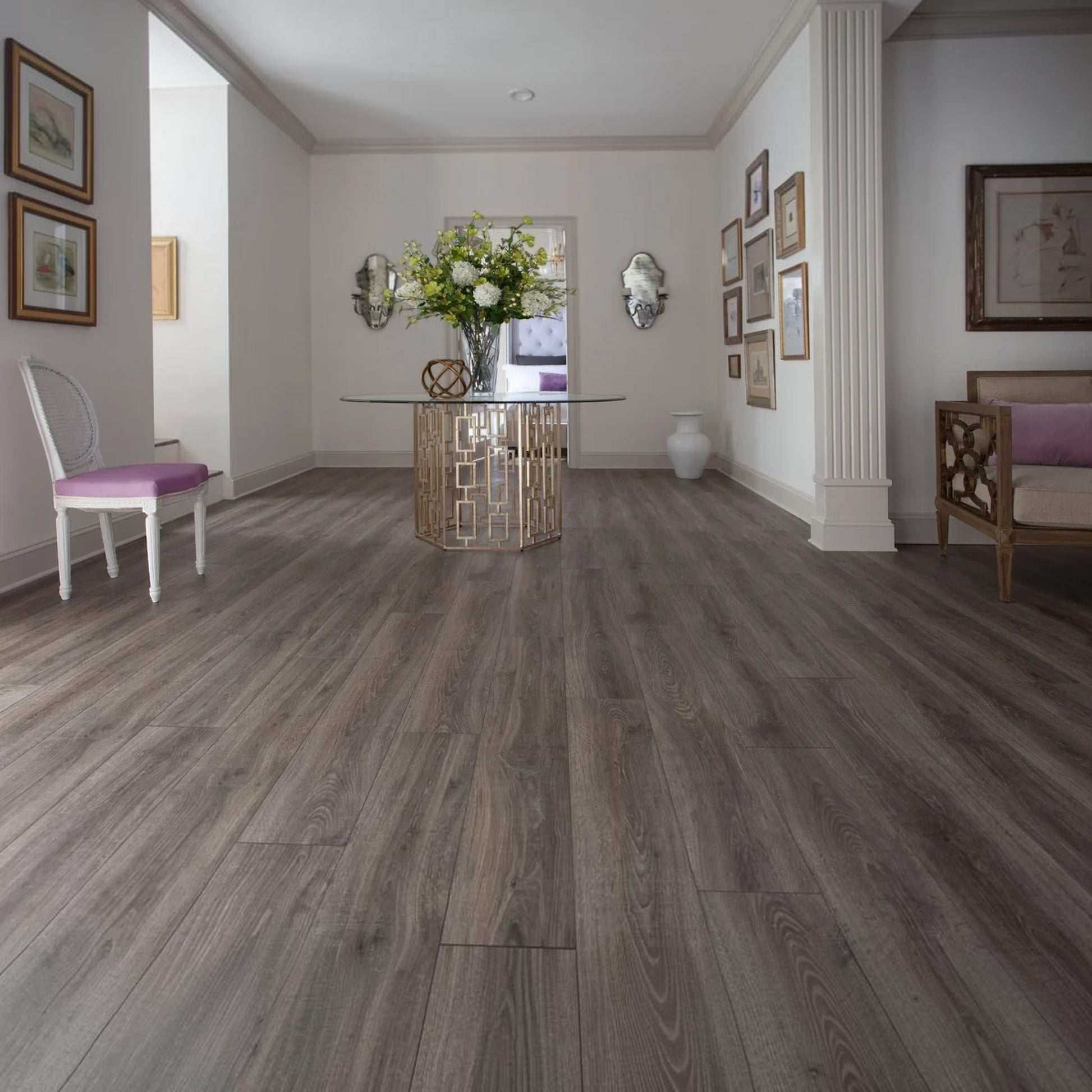 GDM Habitat for Humanity ReStore Driftwood Oak laminate flooring in a bright, elegant home entryway.