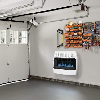 GDM Habitat for Humanity ReStore Dyna-Glo 30K BTU white wall-mounted propane heater with blue flame in a garage