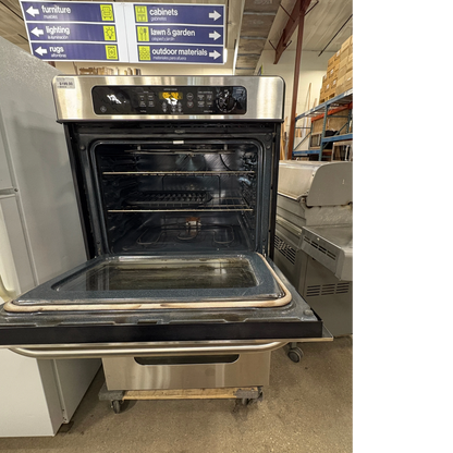 GDM Habitat for Humanity ReStore stainless steel GE electric wall oven with open door in a retail warehouse setting