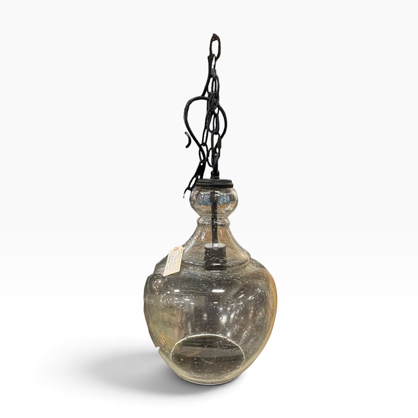 GDM Habitat for Humanity ReStore clear glass pendant light with a bulbous shape and black metal chain suspension